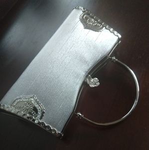 Silver metallic clutch handbag